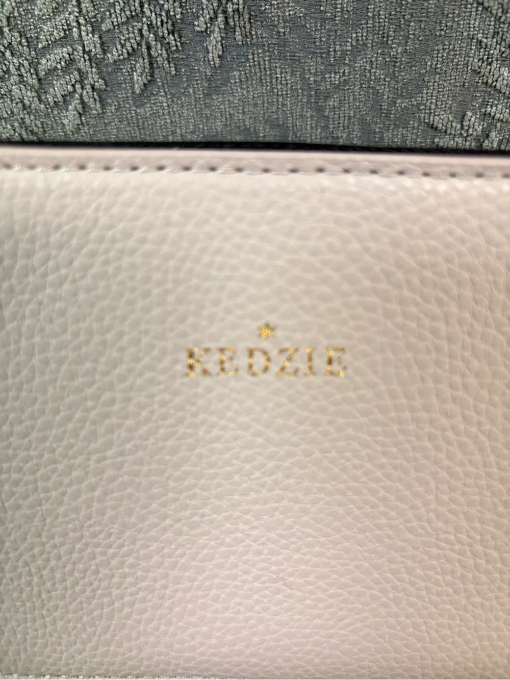 Kedzie Light Blush Pebbled Vegan Leather Crossbody with Gold Logo
